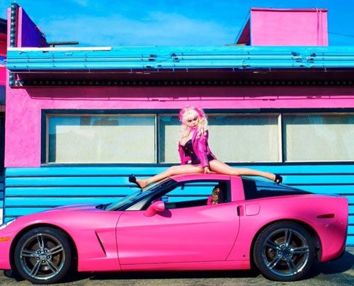 Open Post: Hosted By The Hot Pink Chariot Of Elegance That Angelyne Is Selling On eBay