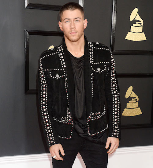 Celebrities arrive on the red carpet for the 59th Grammy Awards