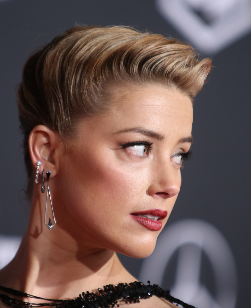 Amber Heard Offers J.K. Rowling Some Side-Eye For Her Comments About Casting Johnny Depp