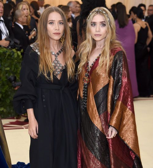 The Olsen Twins Continued Their Holy Reign Of Scowling At The Met Gala