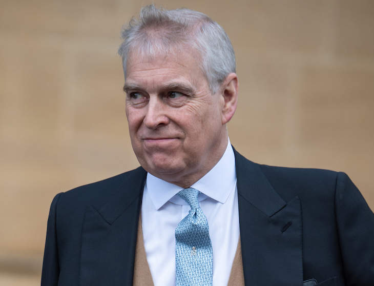 Some People Think That Photo Of Prince Andrew Side-Hugging One Of His Accusers Is Fake