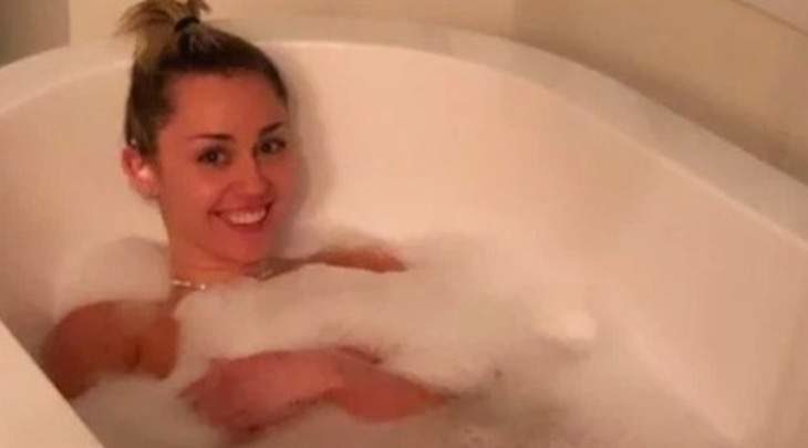 Open Post: Hosted By This Naked Photo Of Miley Cyrus In A Bathtub That Cody Simpson Posted