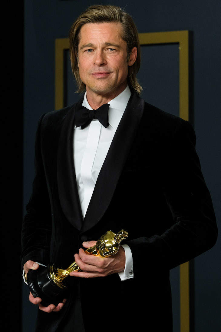 Dlisted | Brad Pitt poses with the Oscar for Actor In A Supporting Role ...