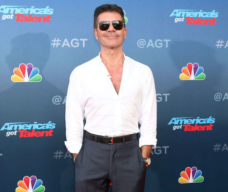 Simon Cowell Broke His Back From Falling Off Of An Electric Bike