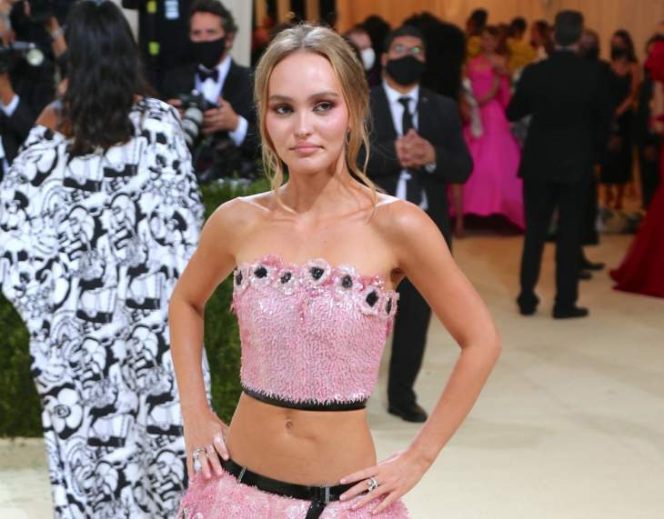 Lily-Rose Depp Has The Word “Cunning” Written Over Her Face In Some Of Johnny Depp’s NFT Works And Is Being Harassed Online By His Fans