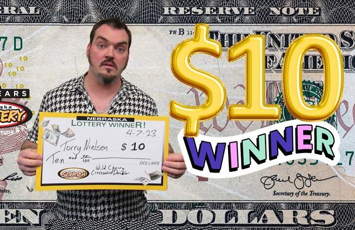 Open Post: Hosted By The Winner Of $10 Lottery Taking A Picture With His Big Check